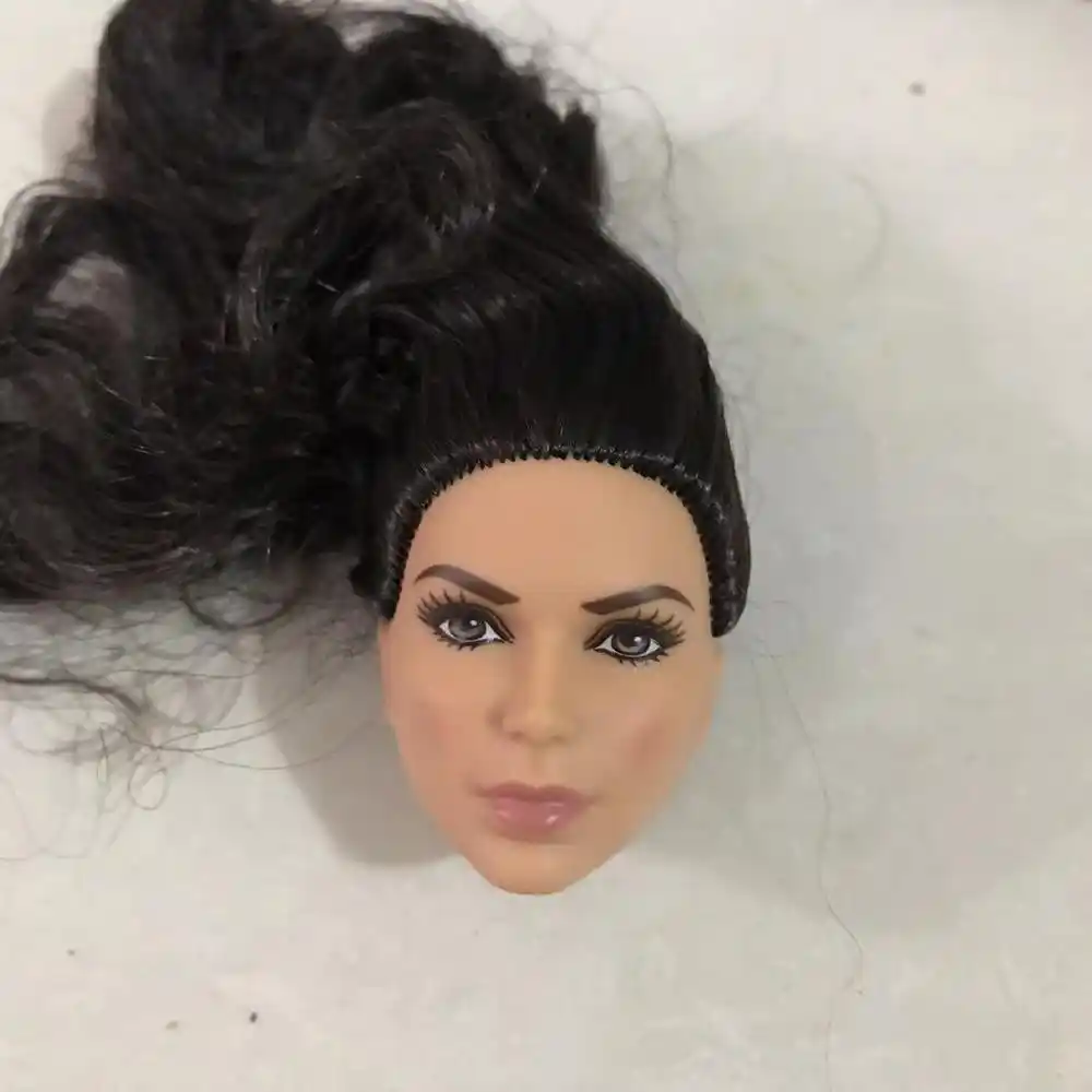 black makeup doll head