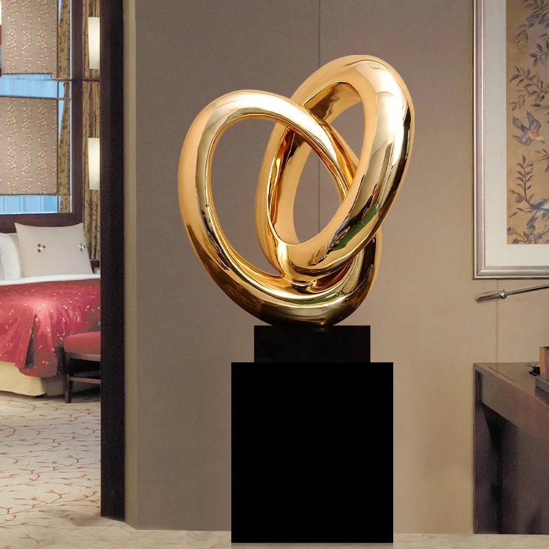 

Modern Crossed Circles Sculpture Electroplated Resin Sculpture Abstract Sculpture Marble Base Statues For Home Decor Accessories