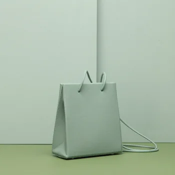 

New Casual Leather Retro Portable Female Bag Solid Color Drawstring Shopping Bag Small Square Bag Simple