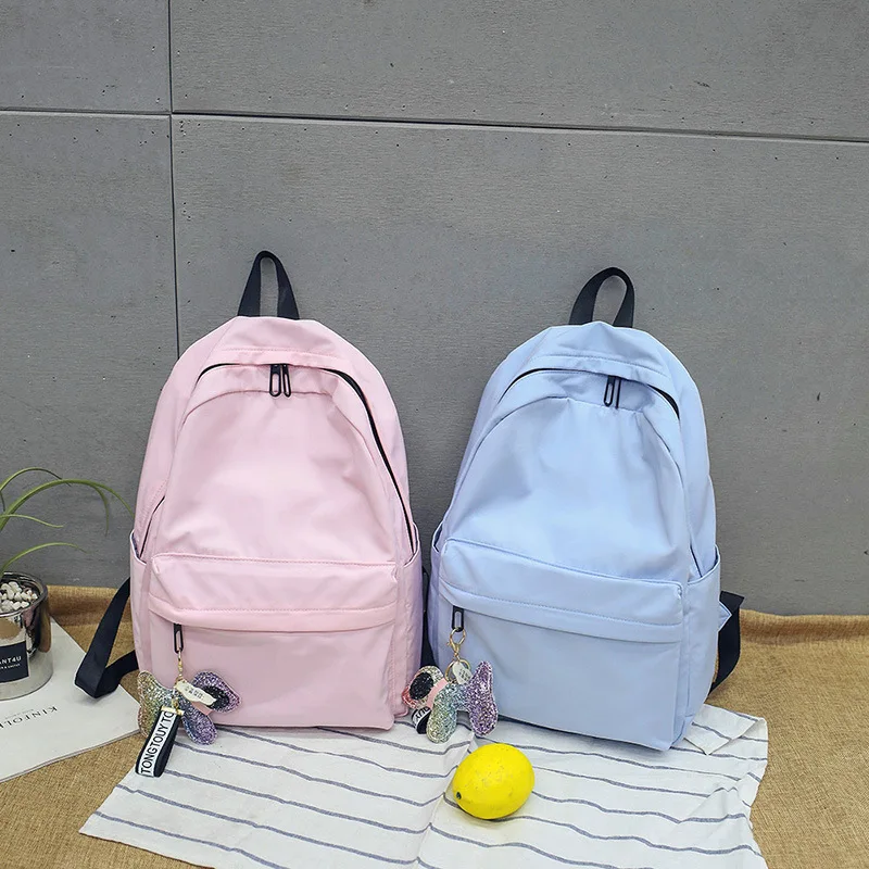 

Solid Color Casual Puppy Pendant Backpack Trend Spring And Summer New Style City Fashion Backpack