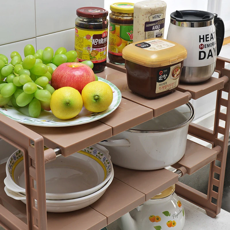 https://ae01.alicdn.com/kf/Hfd0bedf0089a4239bb6c29696cb7508eE/Expandable-Under-Sink-Organizer-2-Tier-Kitchen-supplies-Cabinet-Organizer-Pot-Pan-Spice-Rack-Storage-Shelf.jpg