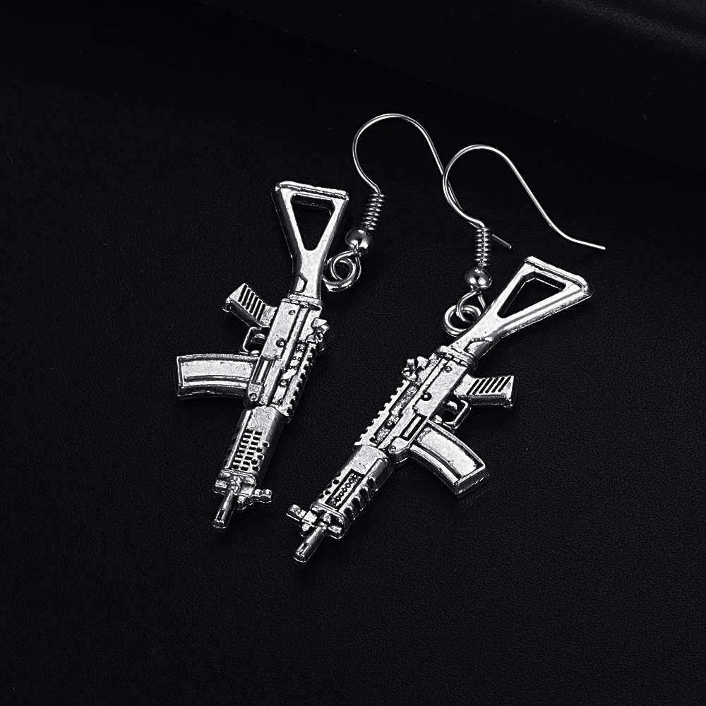 Pendientes de gota chapados en plata antigua para mujer y niña, aretes colgantes con forma de pistola Vintage, joyería linda, Bisutería
