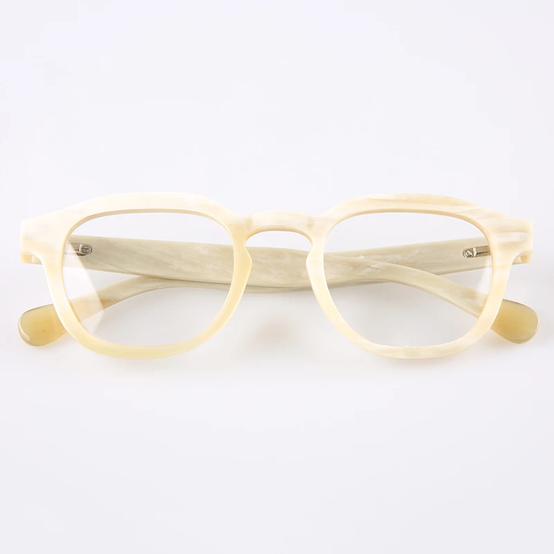 cream colored eyeglass frames