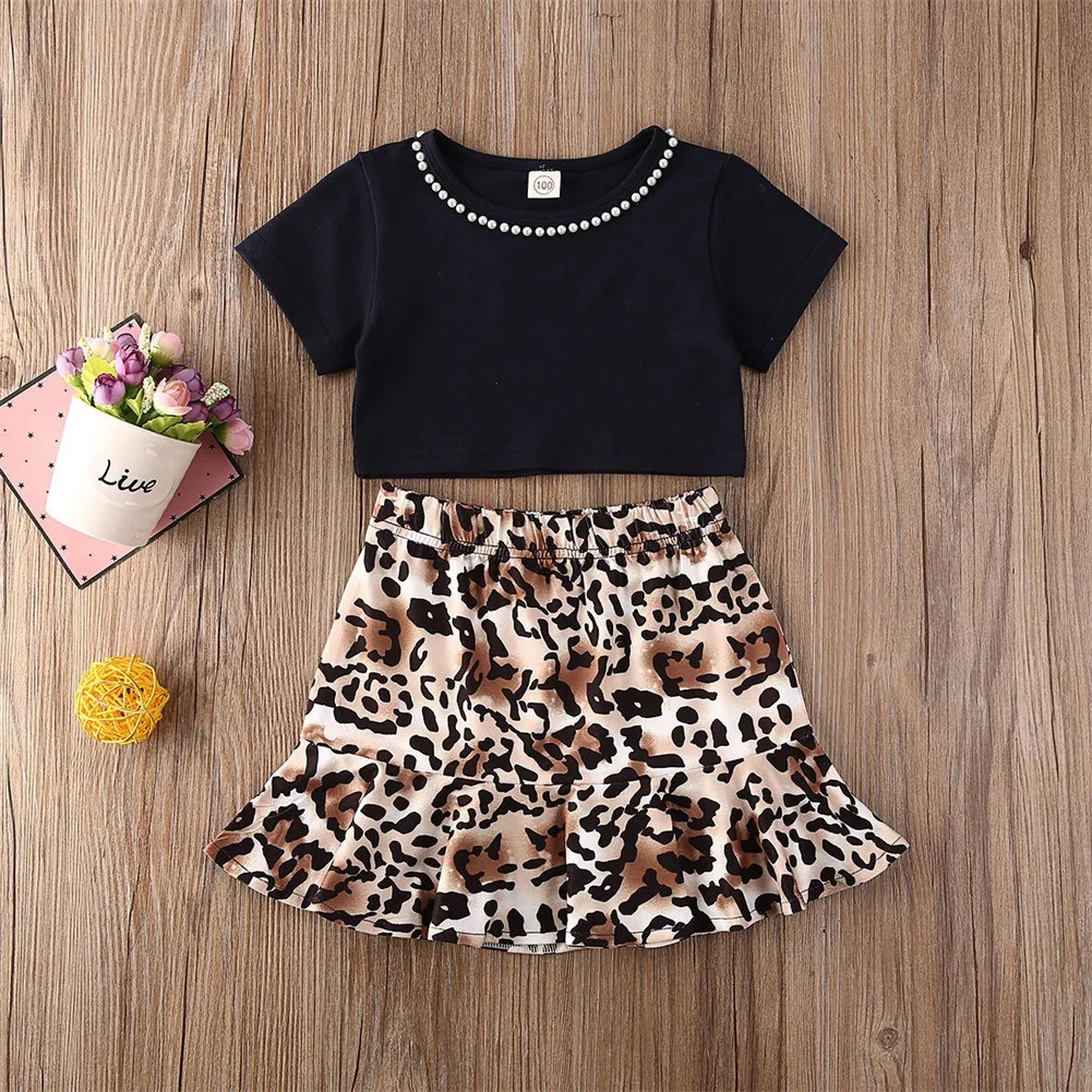 

SOURCE 2020 Summer Hot Selling CHILDREN'S Suit Pearl Crew Neck Short Sleeve Leopard Hip Fishtail Skirt Two-Piece Set