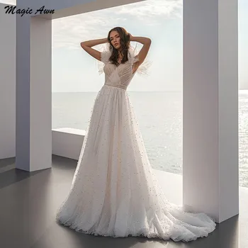 

Magic Awn Graceful Tulle Wedding Dresses Beach Pearls Beaded Open Back Boho Bridal Gowns Sweep Train Abito Da Sposa 2021