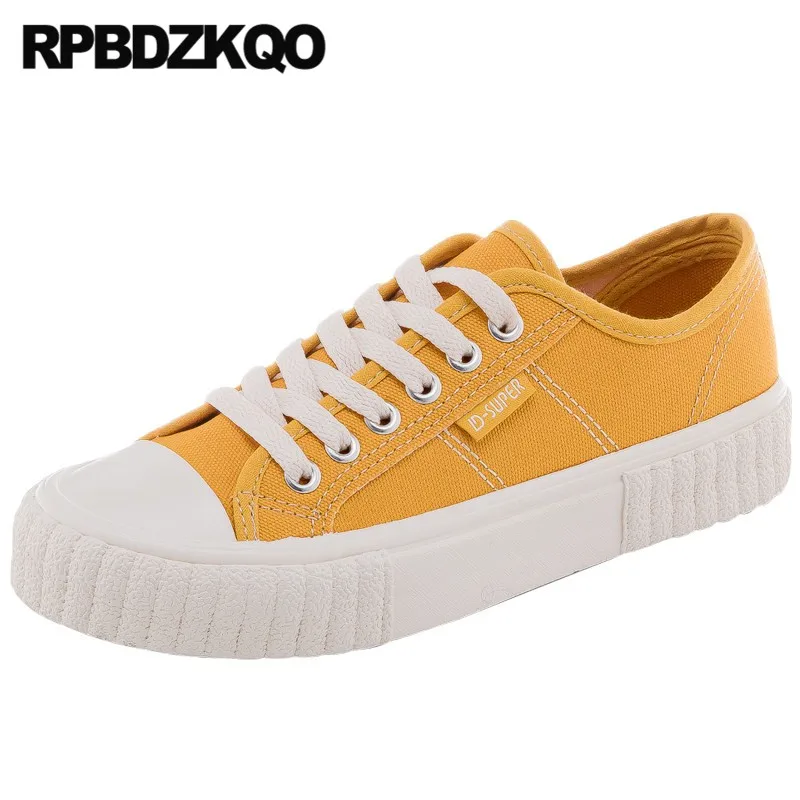 womens black flat trainers