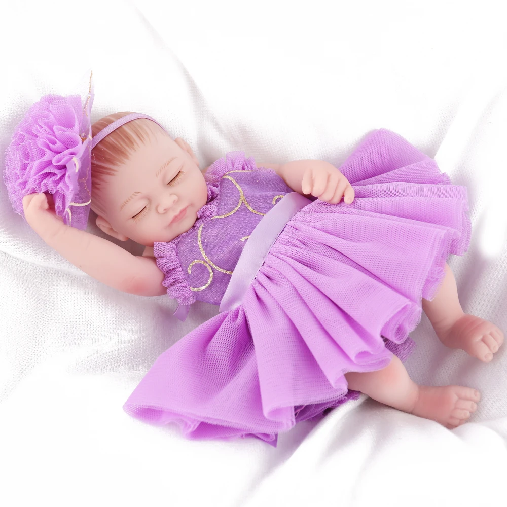 

Beautiful little girl 28cm Body Silicone Reborn Dolls and Purple princess dress cute Realistic Infant Educational bath Toy gift