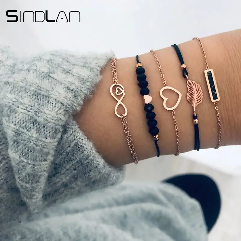 

Sindlan 5PCs Gothic Black Beads Hollow Feather Bracelets for Women Geometric Heart Rectangle Infinity Charm Bracelet Bangles