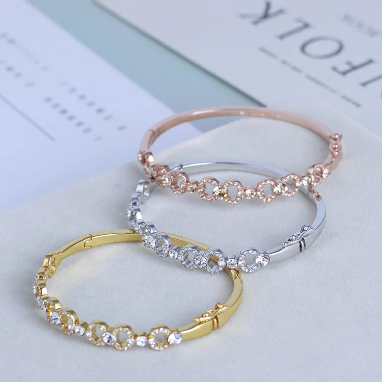 

Elegant openwork mosaic bow inlaid zircon can open the bracelet