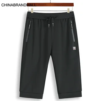 

Men Plus Fat Plus Size Leisure Seven Points Pants Male Fat Man Mesh Elastic Force Speed Dry Middle Pants Male