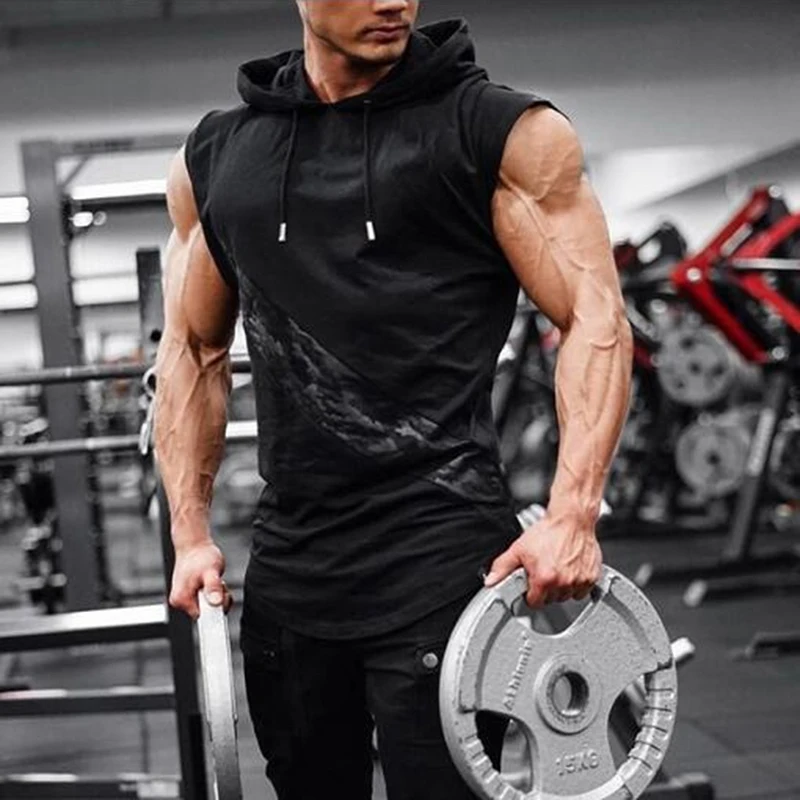 Bodybuilder in a Hood in the Gym