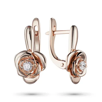 

Earrings in red gold with a diamond