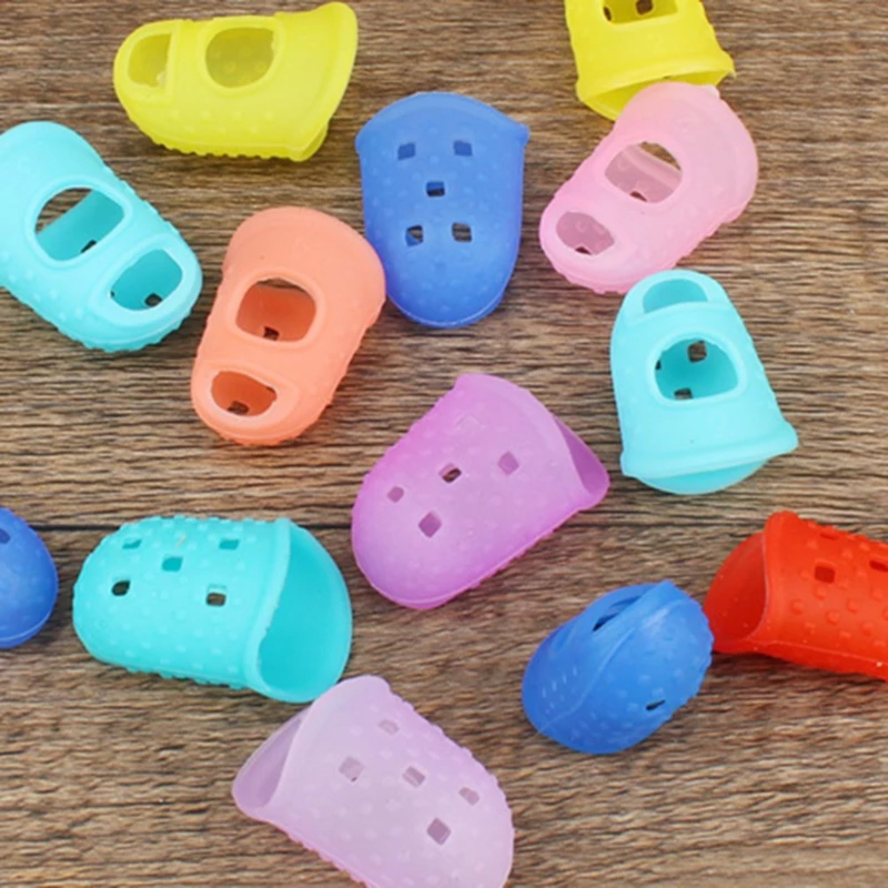 5 pezzi ditali in Silicone colorato scavati traspiranti che suonano  chitarra manicotto protettivo per le dita artigianato fai da te forniture  per strumenti di cucito