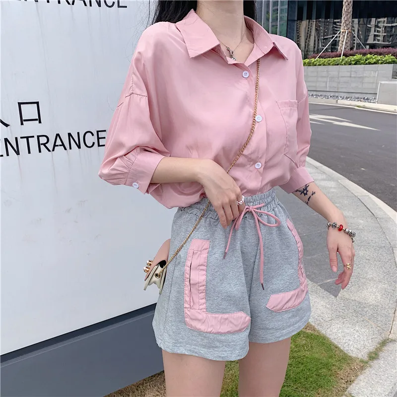 

Photo Shoot ~ Korean-style Loose Casual Short-sleeved Shirt + Elastic Lace-up Fashion Shorts Two-Piece Set