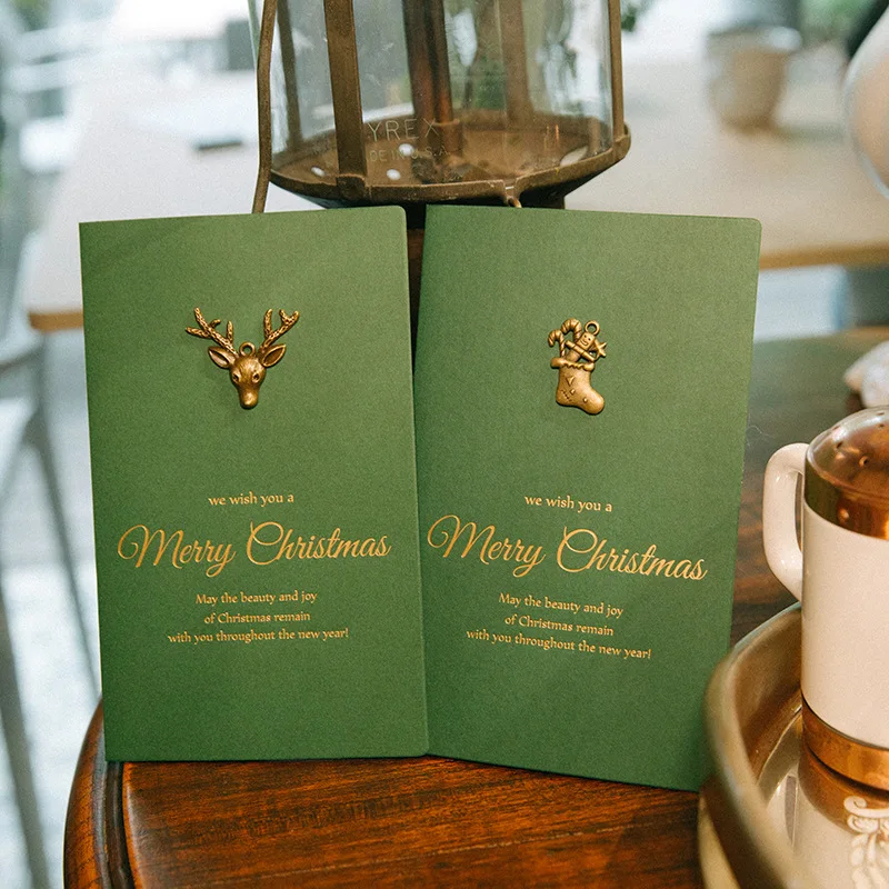 

Wholesale 16 Pieces Creative Paper Cutting Merry Christmas Cards With Metal Design Folding Xmas Blessing Card for New Year