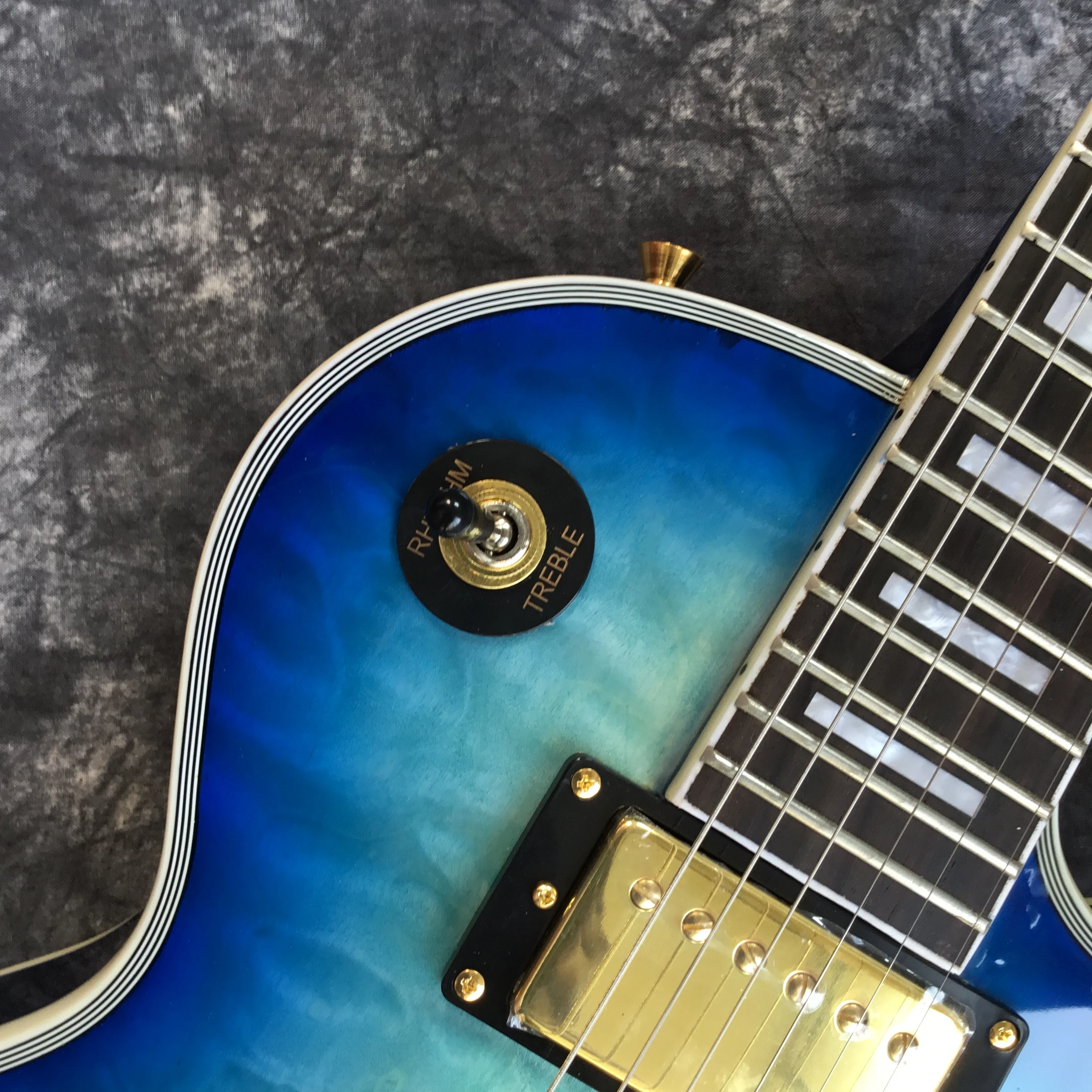 New electric guitar. High quality guitar pickups. Blue color tiger flame gitaar. Gold color hardware. free shipping