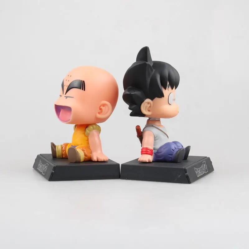 

New Hot Anime Dragon Ball Z Goku Kuririn Car Decoration Phone Bracket Action Figure Pvc Figurine Model Toy Mobile Base Hot Gift