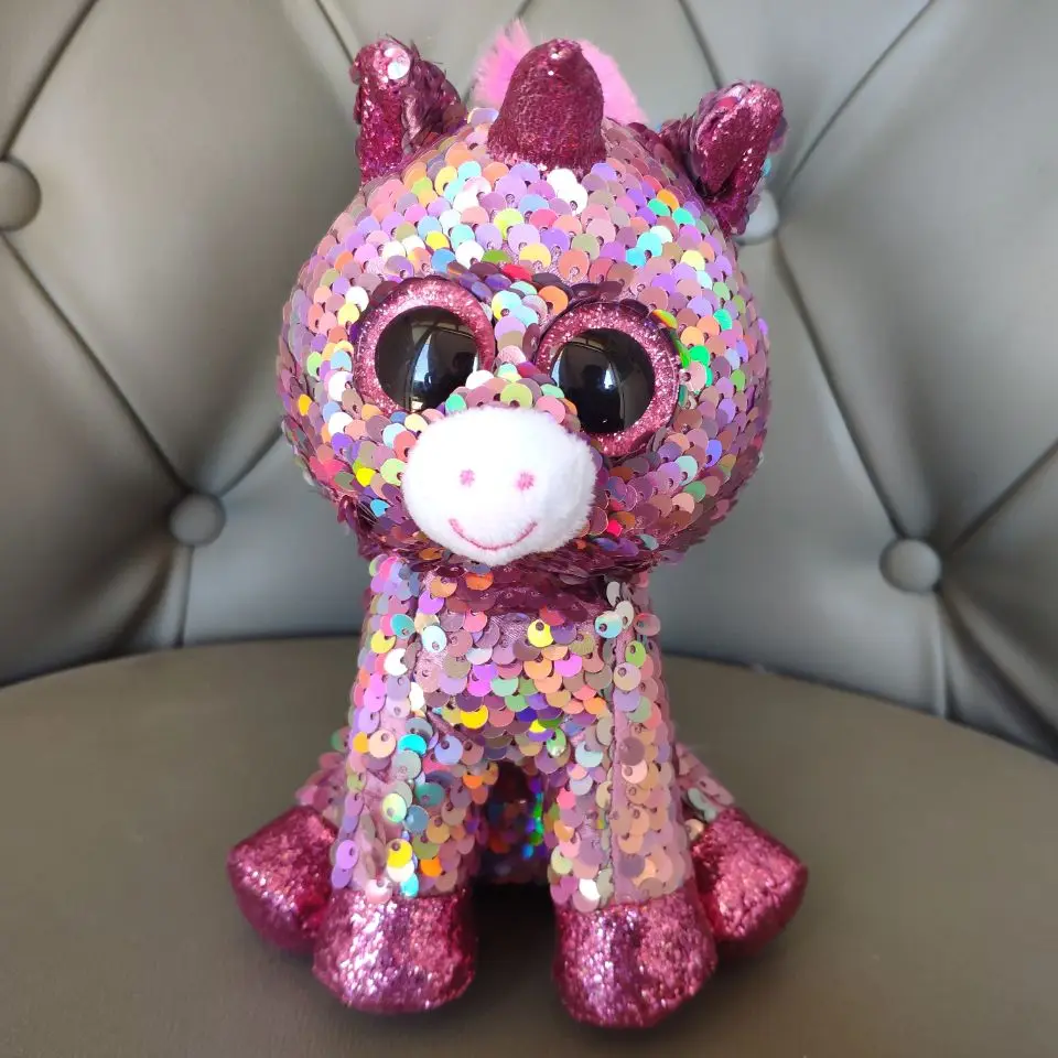 peluche ojos brillantes unicornio