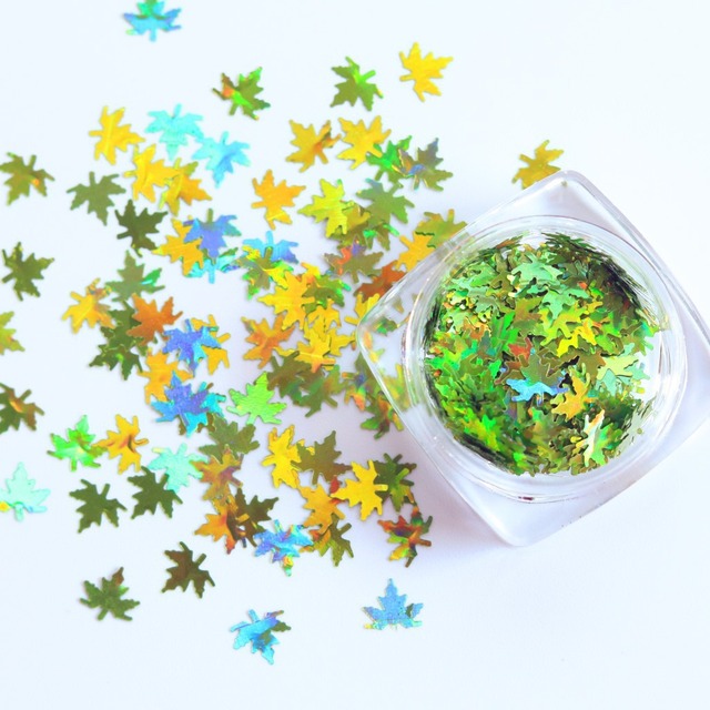 box with 12 styles of color laser maple leaf nail sequins Holographic Metallic Leaf Glitter Sequin Nail Art Patch Decoration