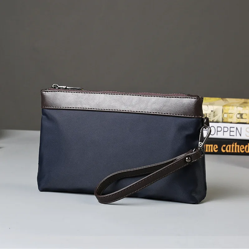 

New Korean version of the clutch bag nylon hand grab storage phone bag envelope bag