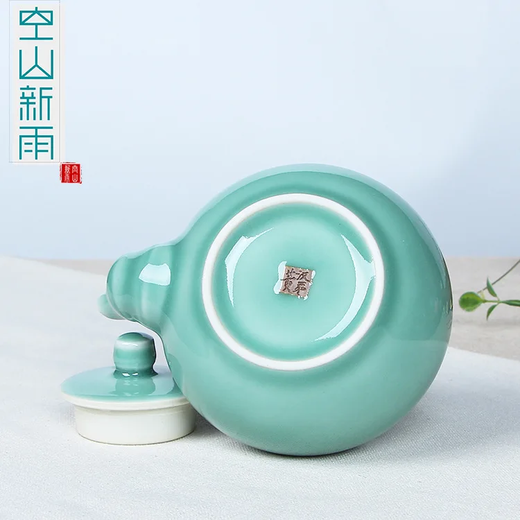 Empty Mountain Xinyu Longquan Celadon Sail Loop-handled Teapot a Pot of Four Cup Kung Fu Tea Set Ceramic Tea Utensil Wholesale