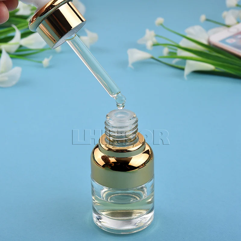10pcs lot 20ml 30ml 50ml Clear Glass Gold Silver Refillable Dropper Bottle Doterra ontainer Essential Oil 5