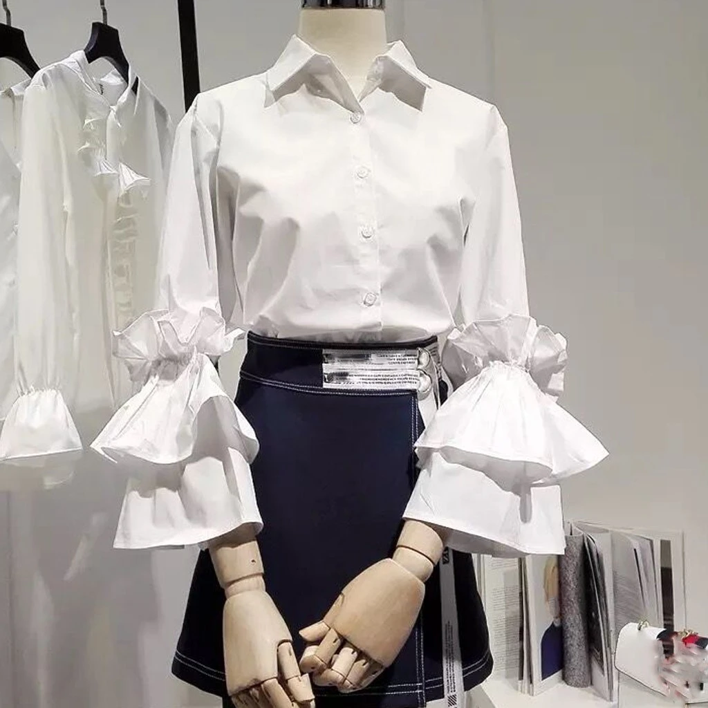 white shirt with ruffle bottom