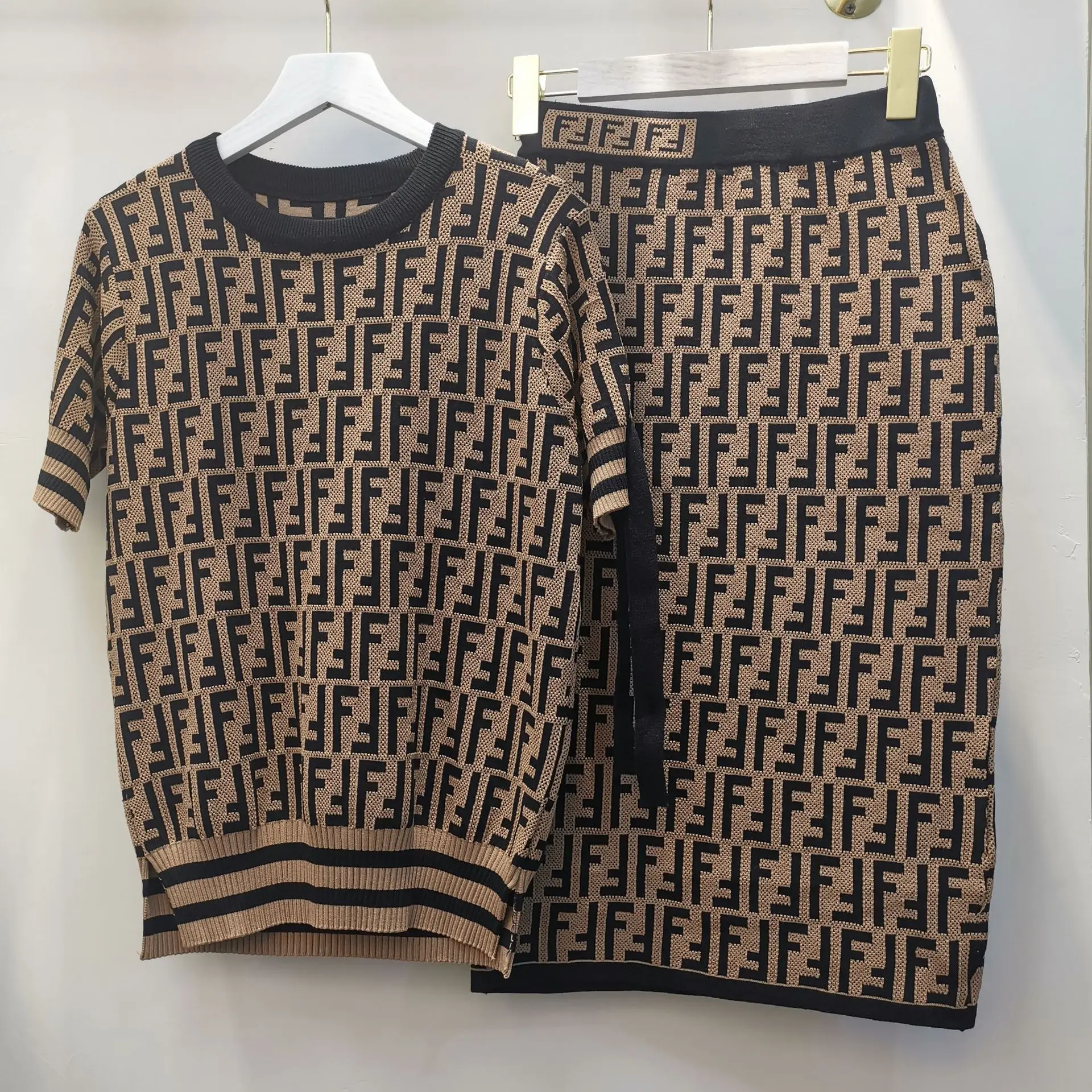 

Ozhouzhan Retro Elegant Lettered Hollow out Bandage Cloth Short Sleeve Crew Neck Tops + Mid-length Sheath Skirt Set