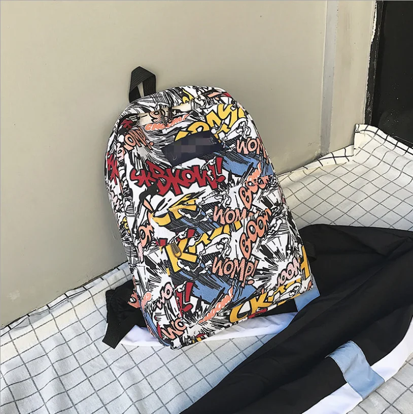New backpack female cartoon alphabet doodle personality wild backpack men and women shoulder bag mochila