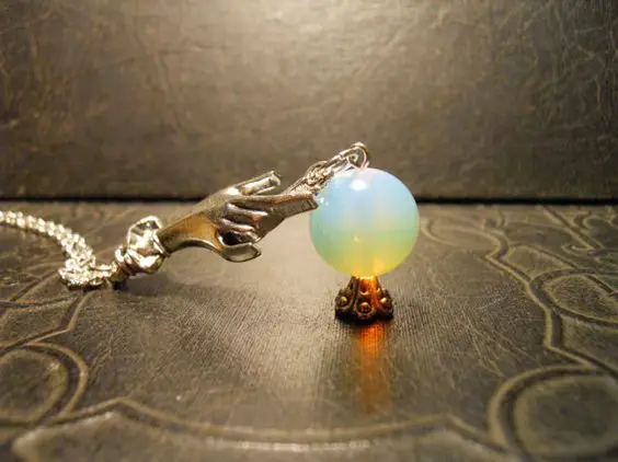 

Crystal Ball in hand Necklace,Wicca,Witch,Pagan,Witches Ball,Gypsy,Steampunk Spells,Magic,Fortune Teller,Psychic,Reading,Scrying
