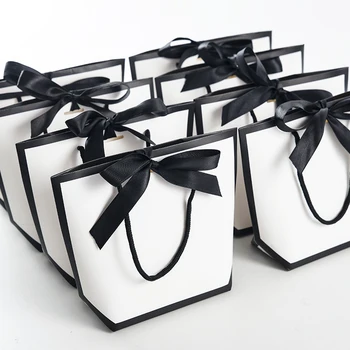 

Large Size Gold Present Box For Pajamas Clothes Books Packaging Gold Handle Paper Box Bags Kraft Paper Gift Bag With Handles Dec
