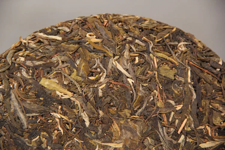 Menghai Early Spring Raw Pu-erh Nannuo Mountain Qizi Tea Cake 357g Shen Pu'er Tea