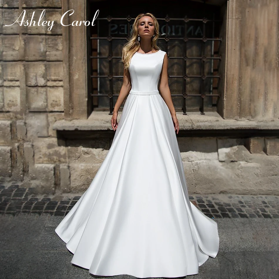 

Ashley Carol Satin A-Line Wedding Dresses 2020 Fashion Scoop Neckline Sleeveless Sashes Beach Bride Simple Vintage Bridal Gowns