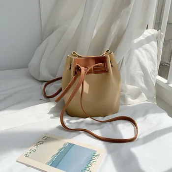 

2020 new good creative art PU stitching hit color handbags fashion single shoulder diagonal drawstring bucket bag