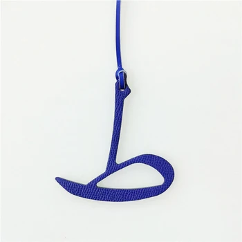 

Wholesale Personalized Real Natural Leather Character Alphabet Arabic Letter Keychain Backpack Pendant Ladies Women Bag Charm