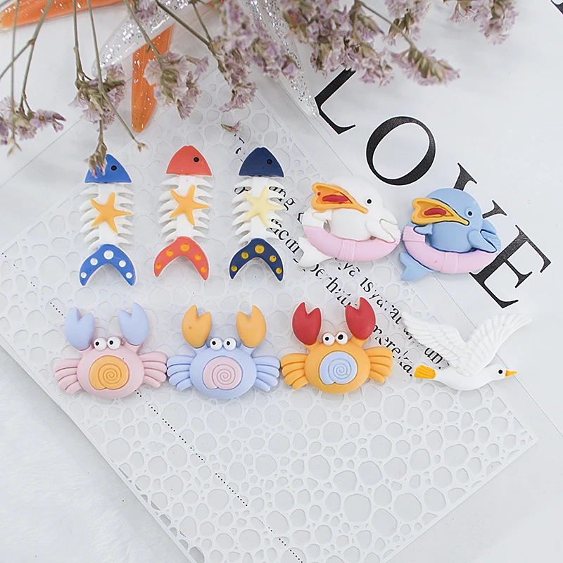 

12pcsResin Cabochons Flatback Ocean Marine style Drift bottle, seagull, sailboat charms for earrings diy making