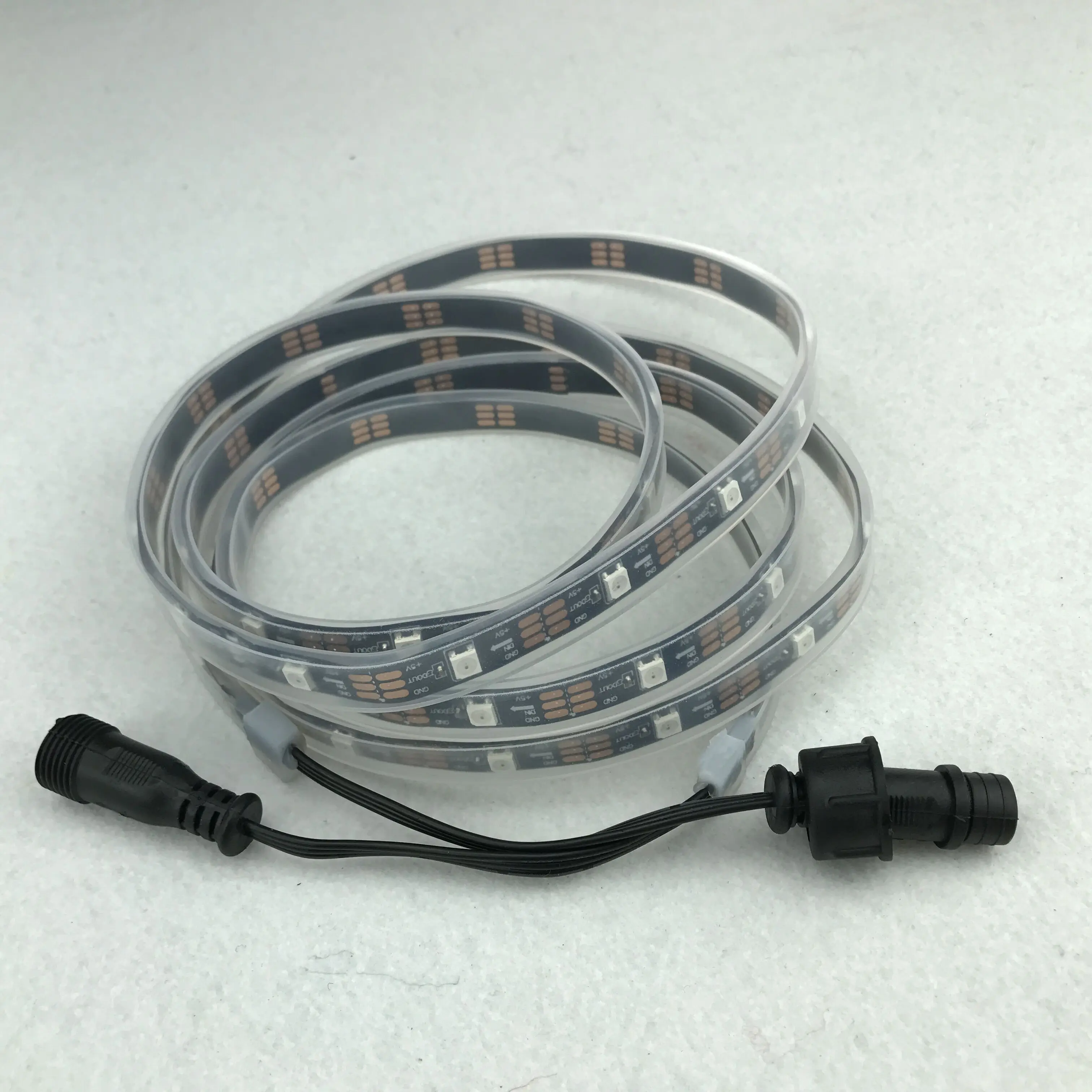 

2.5M/set addressable DC5V WS2812B led pixel strip,30pixels;BLACK PCB,IP66;in silicon tube;with 13.5mm waterproof pigtials