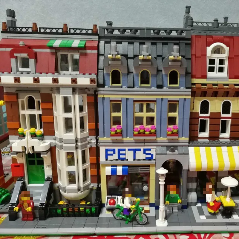 

15009 Originality Streetscape Series 2128pcs Nostalgia Pets Shop Alpinia Oxyphylla Insert Assembling Building Blocks Toys 84009