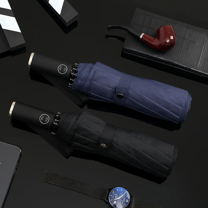 

10 bone automatic umbrella male creative business tri-fold umbrella black folding umbrella gift advertising umbrella