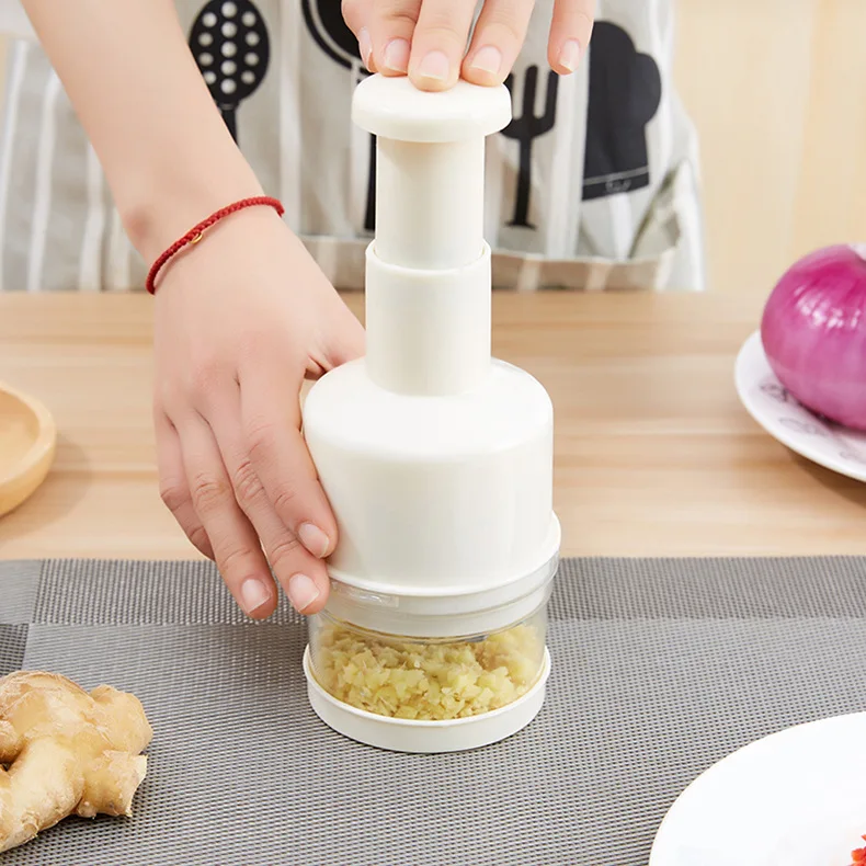 https://ae01.alicdn.com/kf/Hffe41446a6944b9fbc8d89898a35acf2a/Manual-Onion-Chopper-Multi-function-Vegetable-Cutter-White-Pressing-Food-Slicer-Peeler-Kitchen-Gadgets-And-Kitchen.jpg