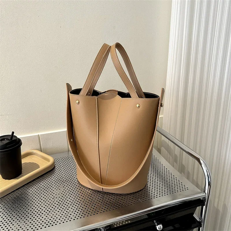 

Женская сумка-мешок в стиле ретро, простая вместительная однотонная дизайнерская сумка через плечо, 2024