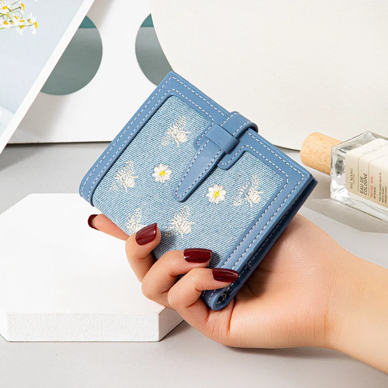 Women's short wallet 2021 new Korean version small fresh embroidery small wallet two fold draw belt multi card slot zero wallet