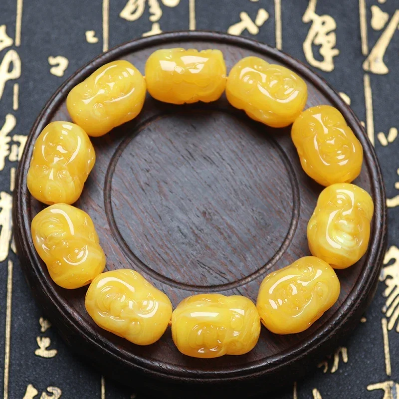 

Chicken Oil Yellow Double-sided Carving Buddha Head Beeswax Bracelet for Men and Women Rosary Buddha Beads Literary Hand String