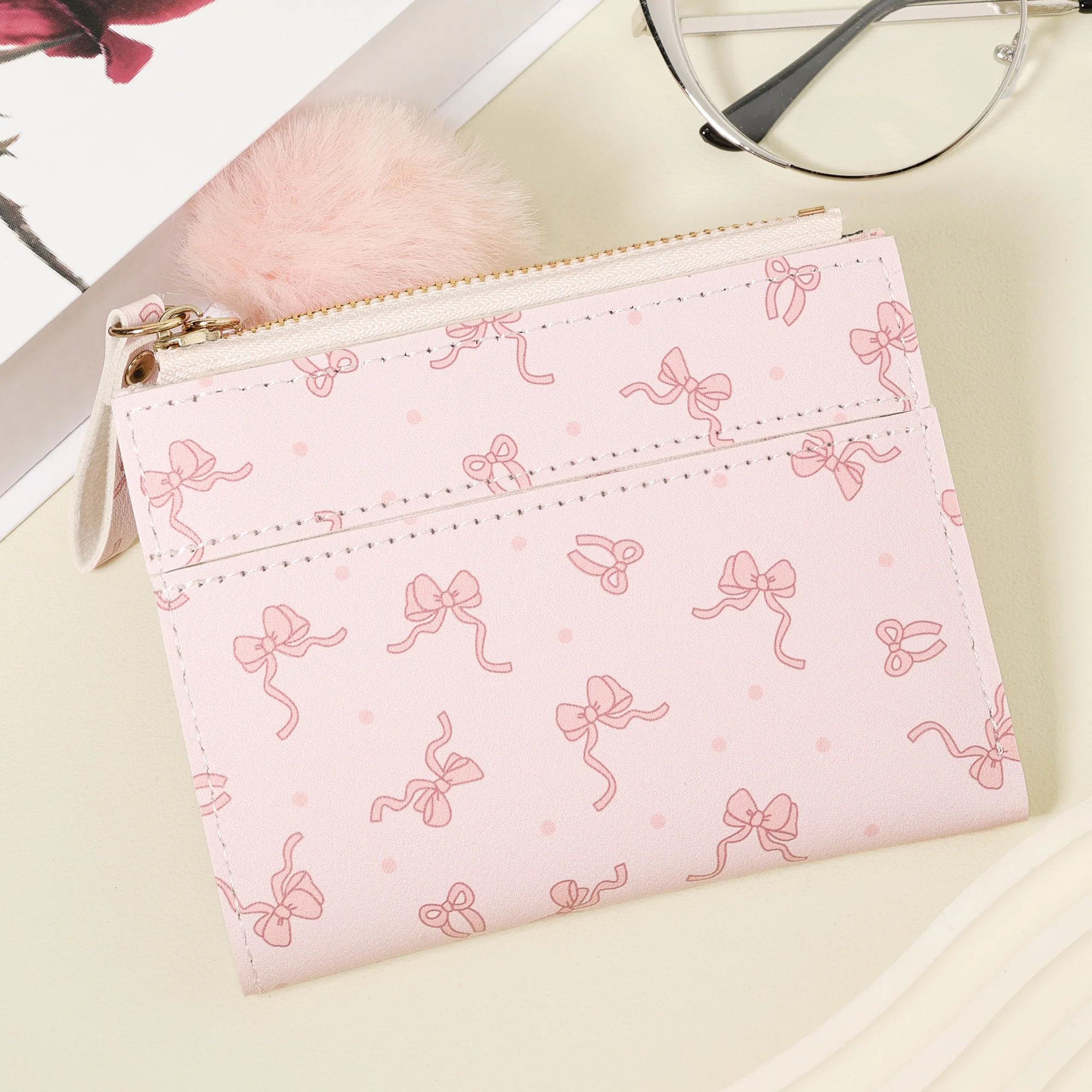 Women's Minimalist Short Wallet with Pom-Pom Charm and Bow Print