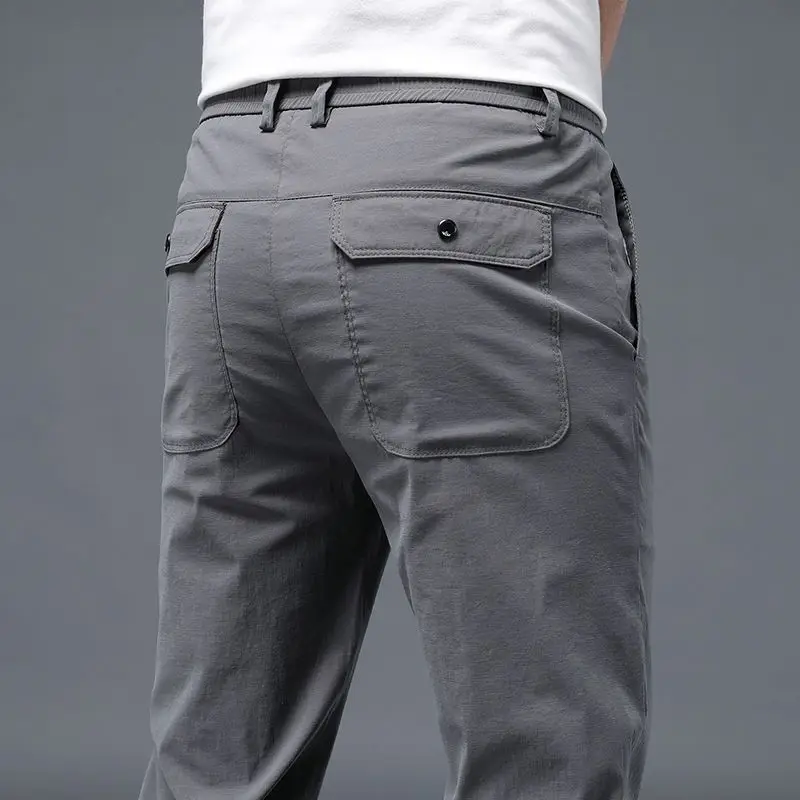 Léto nový ležérní versatile korejské edice módní přímo kalhot muži celistvý elastická pás stahovací kapsa hubený sportovní kalhoty