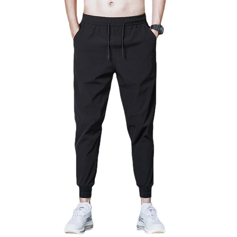 

2022 New Summer M-5XL Korean version of the trend of small feet youth pencil pants men's beam nine points casual pants tide
