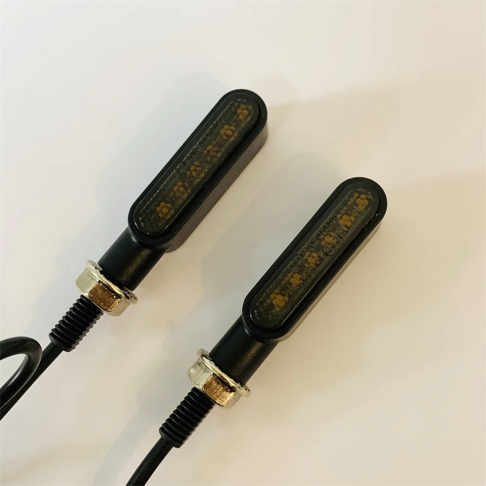 

A pair of new 6LED mini turn signals flowing motorcycle turn signals LED signal lights