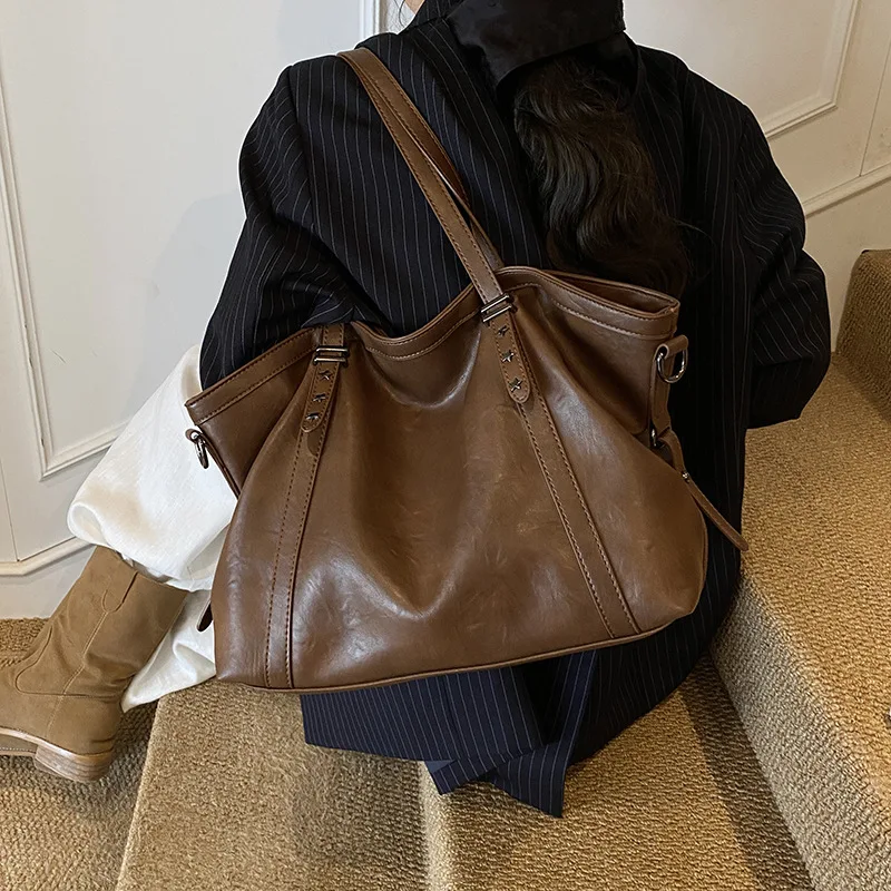 Large capacity women's versatile college style single shoulder soft leather tote bag for casual commuting and crossbody dual-use