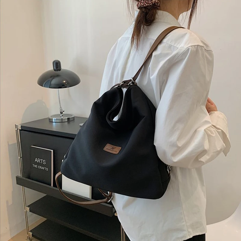 Women's Canvas Tote Bag High Capacity Minimalist College Style Fashion Versatile Casual One Shoulder Crossbody Backpack