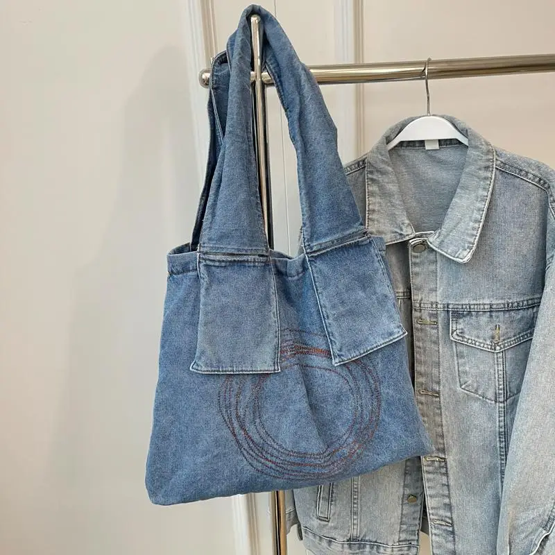 thumbnail image 1 of Bolso de hombro de mezclilla de gran capacidad de moda japonesa y coreana para mujer 2024 Nuevo bolso de compras simple, informal y versátil de moda, 1 of 5